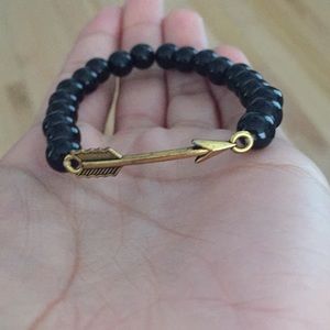 Arrow and black bead bracelet